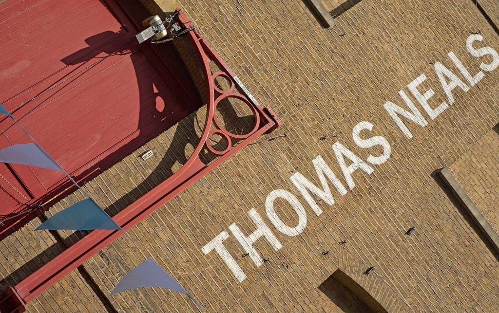 View of old iron warehouse hoist painted red